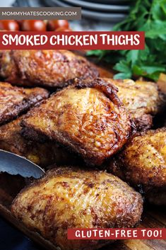 grilled chicken thighs on a cutting board with parsley and tomatoes in the background