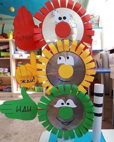 a group of paper cut out turkeys on top of each other in front of a table