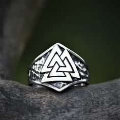 This Valknut Symbol Antique Viking Ring is a beautiful piece of Viking history. It features an intricate ring design that dates back to the days of Vikings and their gods. This design was believed to provide protection for its wearer, as well as bring good luck throughout their adventures. With its stylish look and high-quality construction, this Viking Ring is a great choice for a gift or as part of your own personal collection. Made from premium-quality stainless steel, this ring will never ta Viking Style Engraved Ring As Gift, Viking Style Adjustable Jewelry Ring, Adjustable Viking Jewelry Ring, Adjustable Viking Ring Jewelry, Adjustable Viking Style Ring Jewelry, Handmade Viking Style Ring As Gift, Handmade Viking Ring As A Gift, Adjustable Silver Viking Ring, Handmade Viking Style Ring For Gift