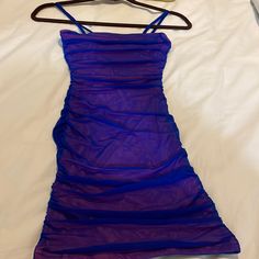 Nice Dress For Women And Sexy In Blue Color. Very Close To Your Body Size S Blue Stretch Mini Dress With Spaghetti Straps, Flirty Blue Backless Mini Dress, Flirty Blue Bodycon Dress With Spaghetti Straps, Blue Flirty Bodycon Dress For Club, Purple Ruched Mini Dress For Club, Flirty Blue Bodycon Dress For Club, Blue Flirty Dress For Club, Blue Ruched Flirty Bodycon Dress, Blue Flirty Ruched Bodycon Dress