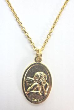 "Thoughtful Cherub / Guardian Angel Medal Pendant Necklace 1\" Die cast, gold plated medal front: Thoughtful Cherub reverse: Guardian Angel signed Italy 20\" Gold plated light cable chain spring ring clasp made in USA Gift Boxed" Italy Necklace, Guardian Angel Necklace, Angel Bracelet, Christian Necklace, Angel Jewelry, Gold Coin Necklace, Angel Necklace, Unusual Jewelry, Lovely Necklace