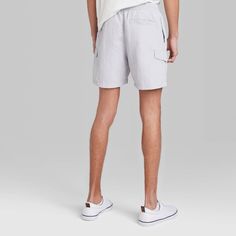 Woven cargo shorts in a solid hue. Made from a midweight, stretchy fabric and designed in a regular-rise cut. Feature regular side and back pockets as well as cargo pockets. Finished off with a full elastic waistband and a front drawstring. If you’re not satisfied with any Target Owned Brand item, return it within one year with a receipt for an exchange or a refund. Original Use™: Always the next evolution. Man Weave, Shipt Shopper, Drawstring Waistband, Stretchy Fabric, Online Purchase, Cargo Shorts, Festival Season, Evolution, Fitness Fashion