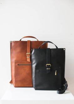 Elevate your daily commute with our meticulously handmade leather laptop backpack for men or women. Versatile and durable convertible leather work bag that seamlessly transforms into a crossbody leather laptop bag with top handles, secure top zipper and practical zipper pockets. * Simple and Elegant design; * Unisex Design - designed for men or women; * Super Practical top handle; * High Quality, Soft Natural Full Grain Leather; * Top Zipper Closure; * Front zipper pocket; * Back zipper pocket; Everyday Brown Leather Backpack With Laptop Sleeve, Everyday Use Soft Leather Laptop Backpack, Everyday Use Soft Leather Laptop Bag, Leather Laptop Backpack For Everyday Carry, Business Leather Backpack With Laptop Sleeve, Minimalist Leather Travel Backpack, Modern Rectangular Leather Backpack For Everyday, Modern Leather Backpack For Daily Use, Modern Leather Backpack For Everyday