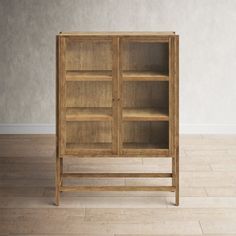 a wooden cabinet with glass doors on the top and bottom shelves, in front of a white wall