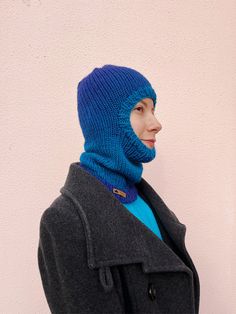 Full face wool balaclava in blue tones 25% wool and 75% acrylic Introducing our hand-knitted full face balaclava in a captivating degrade blue colorway. Meticulously crafted with care, this exceptional accessory combines warmth, style, and versatility to keep you cozy during the colder months. Made from a premium blend of wool and premium acrylic, it offers a comfortable and snug fit. Designed with a full-face coverage, our balaclava ensures optimal protection against the elements. Whether you're engaging in winter sports or simply enjoying outdoor activities, this versatile accessory is a must-have. The soft and breathable materials provide warmth without compromising on comfort. The degrade blue color adds a touch of sophistication and uniqueness to your winter ensemble. With a seamless Colorful Balaclava, Balaclava Wool, Blue Balaclava, Wool Balaclava, Knit Balaclava, Knitted Balaclava, Open Face, Ski Mask, Winter Adventure