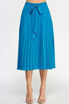 Blue Pleated Midi-length Skirt, Blue Knee-length Pleated Skirt For Spring, Blue Flowy Midi-length Pleated Skirt, Blue Flowy Midi Pleated Skirt, Blue Midi-length Pleated Skirt, Chic Blue Pleated Bottoms, Blue Midi Length Lined Pleated Skirt, Spring Blue Pleated Midi Skirt, Blue Lined Midi Pleated Skirt