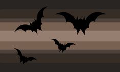 three bats flying in the air over a striped background