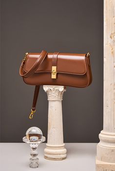 MATERIAL - Made of 100% high quality cowhide split leather, solid color,feels cosy to touch,delicate, durable. The hardware parts are made of cast molding thick hardware, top metal hardware. The stitching is well-made, firm and smooth.DIMENSIONS - 10.2L*2W*4.7H(inches) / 26L*5W*12H(cm).STRUCTURE - This shoulder bag contains 1 main compartment, 1 inner slip pocket, 1 inner zipper pocket. Comfortably holds wallet, mobile phone, cosmetics, keys, charge, essentials and so on.FUNCTIONAL - Come with a Red Leather Handbags, Leather Satchel Handbags, Coffee Color, Satchel Handbag, Baguette Bag, Genuine Leather Handbag, Leather Crossbody Purse, Modern Women, Mini Purse