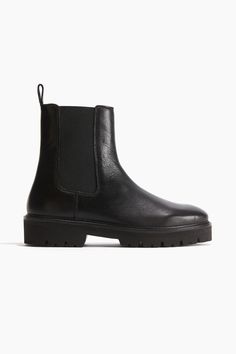 Chelsea boots in leather. Elasticized side panels and a loop at back. Lining in jersey and leather  insoles in leather  and chunky  patterned soles. Black Winter Boots Women, Black Winter Boots, Black Chelsea Boots, Leather Chelsea Boots, Winter Boots Women, Chelsea Boot, Side Panels, Womens Heels, Black Heels