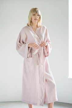 "Every morning, when we get out of bed, we look for a bathrobe, which warms us up and pleasantly embraces us, and in the evenings it wraps around us after a shower or sauna. The \"LinenRain\" bathrobe is made of smooth and soft linen material, which is pleasant to the touch and non-allergenic. In the morning, look for a linen bathrobe and enjoy a cup of coffee or tea and feel how cozy and warm You are. A wide choice of colors will allow You to choose a dream bathrobe. You can buy this natural li Spring Open Front Home Robe, Oversized Long Sleeve Robe For Relaxation, Open Front Cotton Robe For Loungewear, Cotton Open Front Robe For Loungewear, Long Sleeve Robe With Pockets For Loungewear, Relaxed Fit Robe For Home Use In Spring, Long Sleeve Robe With Pockets For Home, Oversized Long Sleeve Robe For Sleep, Oversized Long Sleeve Robe For Home