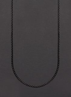 For the men that want to keep their jewelry to a minimum, a minimalist black gunmetal plated stainless steel chain necklace. Material: Stainless steel. Chain Width: 2 mm For reference model is wearing the 24 inch chain. Clasp: Lobster. Type: Round Box. Black Rolo Chain Necklace As A Gift, Black Rolo Chain Necklace For Gift, Black Box Chain Link Necklace, Black Round Metal Chain Necklace, Black Round Stainless Steel Chain Necklace, Black Metal Cable Chain Necklace, Gunmetal Stainless Steel Box Chain Necklace, Gunmetal Stainless Steel Chain Necklace, Gunmetal Box Chain Stainless Steel Necklace