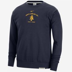 The Aggies hold a unique place within the cultural fabric and tapestry of North Carolina A&T, personifying the promise of representation for generations to come. Honor your school and gear up for game day in this Standard Issue sweatshirt. Collegiate Crew Neck Sports Shirt, Collegiate Crew Neck Sports Sweater, Collegiate Crew Neck T-shirt For Fan Gear, Collegiate Moisture-wicking Sweatshirt For Sports, Ohio State Sweatshirt, Collegiate Fan Gear Crew Neck T-shirt, Kentucky Sweatshirt, Navy Fashion, Mens Activewear