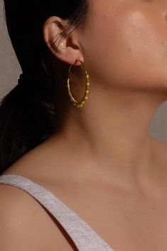 Add a touch of color to your look with these cute hoops, handcrafted using the intricate macrame technique. Each pair features beautiful beads that create an understated color statement, making these earrings a must-have addition to any jewelry collection. Lightweight and versatile, they pair perfectly with any outfit, whether you're dressing up for a special occasion or adding a chic touch to your everyday style. These earrings are a staple item, embodying both craftsmanship and contemporary fa Hypoallergenic Small Hoop Beaded Earrings, Bohemian Yellow Hoop Earrings, Adjustable Hypoallergenic Beaded Earrings, Yellow Beaded Small Hoop Earrings, Small Yellow Beaded Hoop Earrings, Yellow Adjustable Beaded Hoop Earrings, Adjustable Hoop Earrings For Jewelry Making, Adjustable Beaded Earrings For Everyday Wear, Intricate Macrame