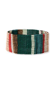 This stretch bracelet features a vibrant combination of green seed beads with metallic accents and multi-color stripes. The swanky and cocktail-ready shine of this bracelet adds an energetic elegance to your wrist, + it offers a comfortable fit while making a stylish statement.7.25" (SEAM TO SEAM), 1.08" W (STRETCH)Handmade by skilled artisans in IndiaHypoallergenic nickel + lead-free brass hardwareThese accessories are made by human hands. A slight variation in size and color is considered part Human Hand, Brass Hardware, Beaded Stretch Bracelet, Color Stripes, Metallic Accents, Stretch Bracelets, Seed Beads, Multi Color, Comfort Fit