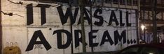 graffiti on the side of a building that says it was all a dream