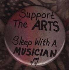 a button that says support the arts sleep with a musician