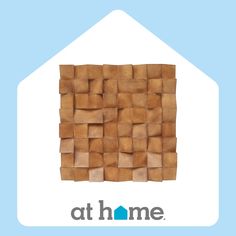 the logo for athome is shown in front of a house with a blue background