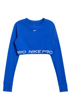 Nike Pro lettering details the stretchy, cropped hem of a second-skin top designed with sweat-wicking Dri-FIT tech that helps you stay dry and comfortable. 13" length (size Medium) Crewneck Long sleeves with thumbhole cuffs Dri-FIT moisture-wicking technology 83% polyester, 17% spandex Machine wash, dry flat Imported Nike Toos, Nike Clothes Women's Outfit, Go-dry Cropped Sports Top, Functional Sports Crop Top With Crew Neck, Functional Crew Neck Crop Top For Sports, Functional Cropped Top With Medium Support, Nike Technical Go-dry Tops, Nike Technical Running Tops, Nike Sweat Resistant Tops For Running