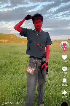 a man standing in the middle of a field