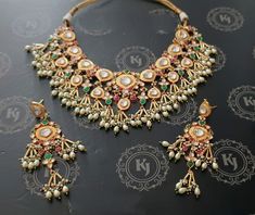 Partywear sabyasachi style multicolored choker Jewelry Set Beautiful so elegant Piece.. Limited In stock..  Product Details: Type: Choker/Necklace Color: Golden color Size: Adjustable Thread Occasion: Festival, Wedding Brand: kundanjewelsbyshiv Metal Type: Gold plated Main Stone: kundan Droppings:Green Set Contain: With Earrings About us: kundanjewelsbyshiv is a pioneer firm in the semi-precious jewellery business in the city of Pune. We offer a wide variety of products from heavy necklaces to hath fool and gorgeous mathapattis. We also have customised exclusive designs for brides around the globe. Be it your engagement, wedding or a reception party We have a variety of wedding jewellery options for you. We are open to customization as per their clients choice and always leave a great warm Diwali Multicolor Kundan Necklace With Intricate Design, Elegant Multicolor Kundan Necklace For Navratri, Multicolor Kundan Necklace With Latkans For Party, Multicolor Traditional Kundan Necklace For Party, Traditional Multicolor Kundan Necklace For Party, Multicolor Intricate Jewelry Sets For Festivals, Heavy Multicolor Kundan Necklace For Festive Occasions, Festive Heavy Multicolor Kundan Necklace, Bollywood Style Multicolor Jewelry Sets For Ceremonial Occasions