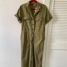 Adorable Gap (New With Tags) Olive Green Cotton Jumpsuit Ties At Waist Super Comfortable, Soft Cotton Available! Green Short Sleeve Jumpsuit With Pockets, Spring Khaki Short Sleeve Jumpsuits And Rompers, Khaki Short Sleeve Jumpsuits And Rompers With Pockets, Short Sleeve Khaki Jumpsuits And Rompers With Pockets, Khaki Short Sleeve Jumpsuit With Pockets, Green Relaxed Fit Jumpsuit With Short Sleeves, Utility Jumpsuit, Gap Pants, Cotton Jumpsuit