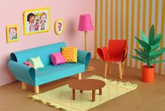 a living room filled with furniture next to a pink wall