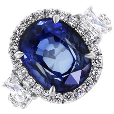 An enviable jewel, this ring sports some dazzling Diamonds & a sparkling Sapphire. Gemstones Type: Sapphire Gemstones Shape: Oval Gemstones Weight: 5.92 ct Gemstones Color: Blue Diamonds Shape: Round & Radiant Side Diamonds Weight: 1.75 ct Side Diamond Color: F - G Side Diamond Clarity: VS (Very Slightly Included) Metal: 18K White Gold Metal Wt: 4.3 gms Setting: Prong & Pave Finger Size: 7 Diamond Sapphire Ring, Blue Sapphire Jewelry, Blue Diamonds, Princess Ring, Ice Princess, Sapphire Diamond Ring, Princess Diamond, Pretty Rings, Sapphire Jewelry