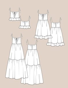 four dresses with ruffles on the bottom and one in the middle, all different sizes