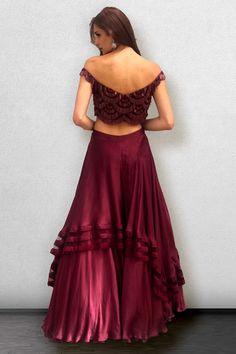 Wine-colored off-shoulder top and skirt are crafted using satin. The top is off-shoulder with embroidery and embellishments. Delivery Period: 2-3 weeks Festive Off-shoulder Sets For Reception, Festive Off-shoulder Reception Sets, Festive Off-shoulder Party Sets, Elegant Off-shoulder Party Sets, Fitted Off-shoulder Evening Set, Silk Sets With Ruffles For Party, Silk Party Sets With Ruffles, Lehenga Silk, Satin Embroidery