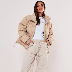 Stone Oversized Puffer Jacket By Missguided Color Is Beige/Cream/Tan Family Hooded Beige Puffer Outerwear, Beige Winter Puffer Outerwear, Fall Khaki Puffer Jacket For Cold Weather, Beige Puffer Winter Outerwear, Khaki Puffer Jacket For Cold Weather In Fall, Cream Hooded Outerwear With Ribbed Cuffs, Hooded Cream Outerwear With Ribbed Cuffs, Urban Long Sleeve Puffer Jacket For Fall, Casual Beige Puffer Jacket For Cold Weather