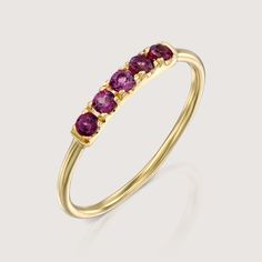 Our popular Candy Ring is gorgeous in a vintage style and set with Amethyst. The ring is 14k gold and has an stunning row of black stones decorated on the top face of the ring. It is delicate and dazzling while showing off some serious sparkle. This ring can be customized with any stones of your liking. Check out our size chart to find the perfect size for you! All features can be customized! Talk to us, we love making custom designs. Our jewelry is carefully handmade in our atelier Our diamonds are conflict free To order by phone click here>> +972(0)722991000 Elegant Multi-stone Amethyst Ring In Yellow Gold, Elegant Yellow Gold Multi-stone Amethyst Ring, Elegant Yellow Gold Amethyst Open Ring, Elegant Multi-stone Amethyst Promise Ring, Elegant Yellow Gold Amethyst Crystal Ring, Elegant Yellow Gold Crystal Amethyst Ring, Classic Yellow Gold Crystal Ring With Gemstone, Classic Yellow Gold Crystal Gemstone Ring, Fine Jewelry Yellow Gold Amethyst Open Ring