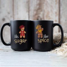 two black coffee mugs with the words his and her sugar and spice on them