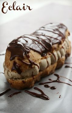 a pastry with chocolate drizzled on it