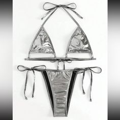 Silver Bikini With Underboob Out Nwot I Have Sizes L And Xl Silver Stretch Swimwear For Swimming, Metallic Triangle Top Swimwear For Summer, Silver Swimwear For Summer Beach, Silver Beach Swimwear For Summer, Silver Swimwear For Beach In Summer, Metallic Swimwear For Poolside Summer, Metallic Swimwear For Club In Summer, Metallic Summer Swimwear For Poolside, Metallic Swimwear For Poolside In Summer