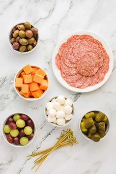 the ingredients to make this appetizer include olives, cheese, and meat