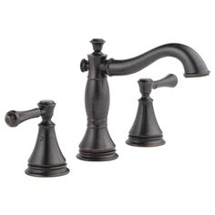 an antique style faucet with two handles