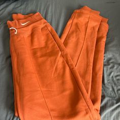 Nike Sweatpants Size: Medium Never Worn. I Love These Sweats! Sadly They Just Are Way Too Big/Long For Me. I’m 5’3 And They Bunch Up Bad At The Bottom. Would Fit Someone Taller. My Loss Your Gain Burnt Orange Nike Sweatpants, Nike Athleisure Bottoms For Lounging, Nike Pants With Elastic Waistband For Loungewear, Nike Relaxed Fit Bottoms For Lounging, Nike Solid Color Loungewear Bottoms, Nike Stretch Pants For Loungewear, Nike Jogger Trousers For Loungewear, Nike Bottoms With Elastic Waistband, Nike Sweatpants For Loungewear