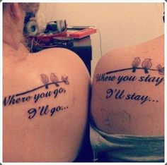 two women with tattoos on their backs saying, where you stay and when you don't