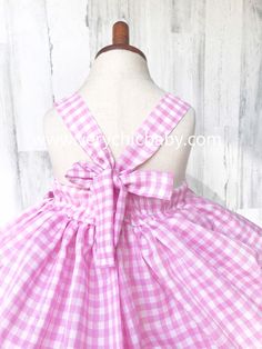 "Our Pink Gingham Country Girl Dress is perfect for your darling! It has all the important details you could want in a dress. It is the perfect happy dress with full skirting and a vintage eyelet trim! The bodice back has encased elastic giving it a vintage feel and look but no rubbing your little ones back and allows for the dress to be worn now & later since it is a grow with me style. This dress pattern is a mix of my own as well as the Rabbit Rabbit Hummingbird & has been \"Blake tes Playful Gingham Dress With Ruffles, Preppy Pink Ruffled Dress, Preppy Pink Ruffle Dress, Preppy Pink Dresses With Ruffles, Sweet Gingham Cotton Dress, Sweet Gingham Dress With Ruffles, Sweet Gingham Dress For Spring, Preppy Gingham Dress For Picnic, Sweet Spring Gingham Dress