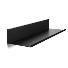 a black shelf sitting on top of a white wall in front of a white background