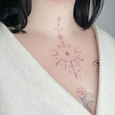 a woman with a tattoo on her chest