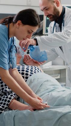 a doctor is giving an oxygen to a patient