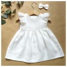 Gorgeous baby girl or toddler dress made of highest quality washed 100 % linen with ruffle lace. Perfect for your little one's baptism, flower girl, first birthday or other special occasion. Clothes made of linen has amazing properties: in the hottest time of the year - cools, in a cool - warms. It's natural, breathing and extremely cute looking! 🌿 Material: 100% linen, Oeko-Tex 100 certified. Lace : linen or cotton Colors: snow white, milk white, greyish sand 🌿 Please note. Each dress is uniq Summer Lace Dress With Lace Bodice For Dress-up, First Communion Spring Dress With Lace Trim, First Communion Lace Patchwork Dress For Spring, First Communion Spring Dress With Lace Patchwork, Spring First Communion Dress With Lace Patchwork, Lace Dress For First Communion In Summer, Elegant Broderie Anglaise Baptism Dress For Spring, Elegant Spring Baptism Dress With Broderie Anglaise, Elegant Summer Lace Dress For First Communion