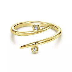 Gabriel & Co. 14K Yellow Gold Bezel Set Diamond Midi Open Wrap Ring Women's fashion Ring Style Number: LR50531Y45JJ Division: Gaby Collection: Kaslique Style: Midi Starting Price: $475.00 USD* Carat Weight: 0.01ct Fashioned in sleek and polished 14K yellow gold, this bypass style midi ring wraps gracefully around the finger. The modern open silhouette is expertly accented with a pair of bezel set diamonds lending 0.01cts of subtle sparkle. All Dimensions are approx. *The possibilities are not li Luxury Yellow Gold Bypass Ring For Anniversary, Elegant Yellow Gold Bypass Ring With Single Diamond, Luxury Gold Bypass Ring With Brilliant Cut, Luxury Gold Bypass Ring With Vvs Clarity, Gold Bypass Ring With Diamond Cut For Wedding, Gold Diamond Cut Bypass Ring For Wedding, Luxury Yellow Gold Bypass Ring, Gold Bypass Wedding Ring With Vvs Clarity, 14k Yellow Gold Bypass Ring With Single Diamond