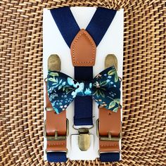 Your special guy will look so handsome when he shows up wearing this Rifle Paper Co navy bow tie and navy blue buckle suspenders! This floral bow tie & suspender set is a great choice for family photos, wedding, ring bearer outfit, birthday celebration or any other special occasion. ❤ Our suspenders are extremely comfortable and form a Y-Back. **Please Specify Above** SET- Bow Tie and Suspenders SUSPENDERS- One Pair of our Quality Suspenders BOW TIE- One Bow Tie on white elastic strap or all Ring Bearer Outfit Navy Blue, Wedding Ring Bearer Outfit, Navy Blue Suspenders, Navy Blue Bow Tie, Navy Bow Tie, Blue Suspenders, Wedding Ring Bearer, Outfit Birthday, Bearer Outfit