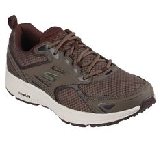 It's easy to get into a workout routine with the Skechers GO RUN Consistent running and training shoe. This lace-up style features smooth leather and mesh upper, responsive ULTRA LIGHT cushioning and an Air-Cooled Goga Mat cushioned insole. | Skechers Men's GOrun Consistent Sneaker Skechers Store, Mens Skechers, Wide Shoes, Workout Shoes, All About Shoes, Brown Sneakers, A Workout, How To Run Faster, Brown Fashion