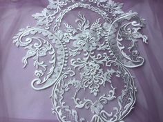 Luxury Embroidery Ivory Bridal Lace Applique/Wedding Dress Lace Back Applique Listing is for 1 piece Stock Color Ivory as picture shown Measurements About 40cm*34cm Elegant Machine Embroidered Fabric For Wedding, Elegant White Embroidered Fabric With 3d Embroidery, Elegant White 3d Embroidered Fabric, Elegant White Fabric With 3d Embroidery, White Lace With Intricate Embroidery For Ceremonies, White Intricate Embroidered Lace For Ceremony, White Intricate Embroidery Lace For Ceremony, White Embroidered Lace For Ceremony, Elegant White Embroidered Fabric For Wedding