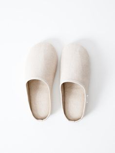 A pair of room shoes is an essential part of every Japanese home. This minimalist version is made from Sasawashi fabric, a pill-free fabric that effortlessly absorbs moisture and odors from the skin. The combination of antibacterial Kumazasa fibers and breathable washi keeps these room shoes feeling fresh and feeling comfortable in any season. About SasawashiSasawashi was founded as a reaction to the wastefulness and ephemeral lifespan of the textile industry. Made from absorbent washi (Japanese Japanese Home, Japanese Room, Shoes Beige, Textile Industry, Japanese House, House Shoes, Favorite Scents, House Slippers, Free Fabric