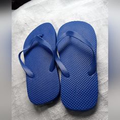 A Summer's Comfort And Essential. These Blue Thick Sole Flip Flops Are Brand New, Never Worn. Information Sticker Still Attached. Size: 9-10 Usa 42-43 Europe 27-28-Mexico The Sole Of These Flip Flops Are Thicker Than The Average Pair Of Flip Flops. Brand New Without Tag But Still Has Product Information Sticker. Comfortable Slip-resistant Blue Sandals, Blue Non-slip Open Toe Slippers, Casual Blue Non-slip Flip Flops, Summer Blue Slippers With Rubber Sole, Blue Synthetic Slippers With Rubber Sole, Blue Summer Slippers With Rubber Sole, Blue Non-slip Closed Toe Flip Flops, Blue Non-slip Slip-on Flip Flops, Blue Non-slip Casual Flip Flops