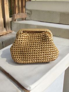 HANDMADE ELEGANT HIGH QUALITY CLUTCH 🛍️You can use this gold metallic raffia bag at invitations, parties and special events for 4 seasons and it will turn all eyes on you.  ✔️Crochet Metallic Raffia Clutch Bag is knitted with metallic yarn. Luxury gold metallic leather rope is used.  ✔️A lining of the appropriate color is sewn into the handmade metallic hand bag ✔️The bag has satin lining.  ✔️The interior of the raffia bag is fully lined with satin and has a hidden metal lock.  ✔️Suitable for u Gold Evening Clutch Bag, Gold Evening Clutch With Gold-tone Hardware, Rectangular Evening Bag With Gold-tone Hardware For Wedding, Handmade Gold Handheld Bag, Gold Shoulder Bag With Gold-tone Hardware For Events, Handmade Gold Handheld Shoulder Bag, Rectangular Wedding Evening Bag With Gold-tone Hardware, Gold Handheld Bag With Gold-tone Hardware, Gold Handheld Bags With Gold-tone Hardware